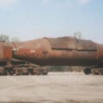 Heavy machinery on transportation vehicle