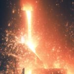 Intense foundry scene with glowing metal