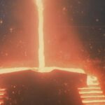 Glowing molten metal in industrial setting