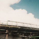 Metal platform against blue sky backdrop