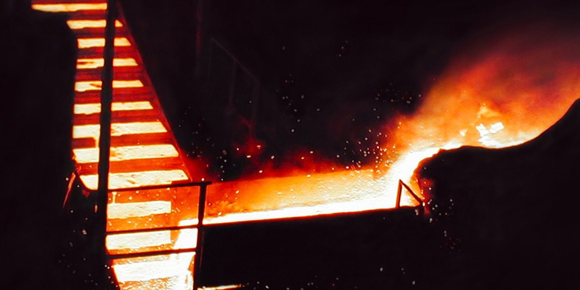 Molten metal flowing in a foundry