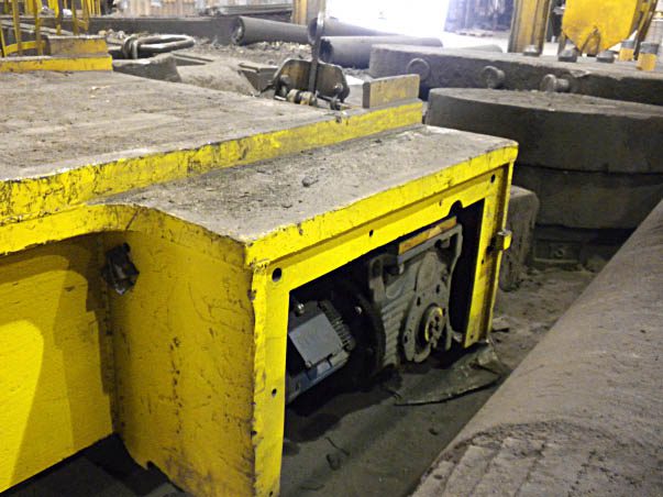 Yellow industrial equipment with gears