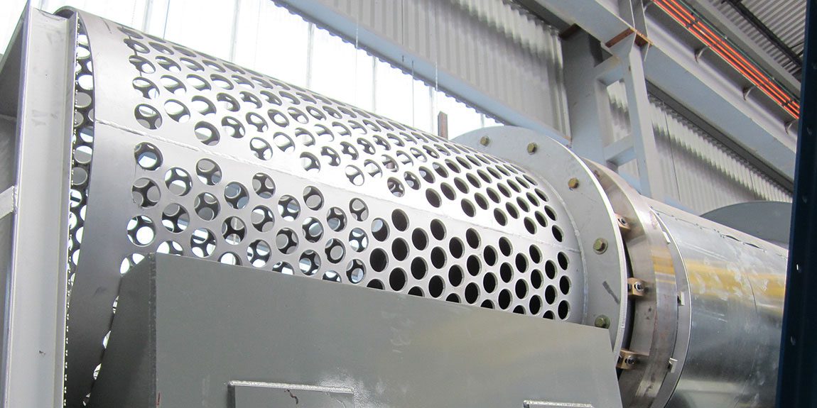 Perforated industrial cylinder in warehouse environment